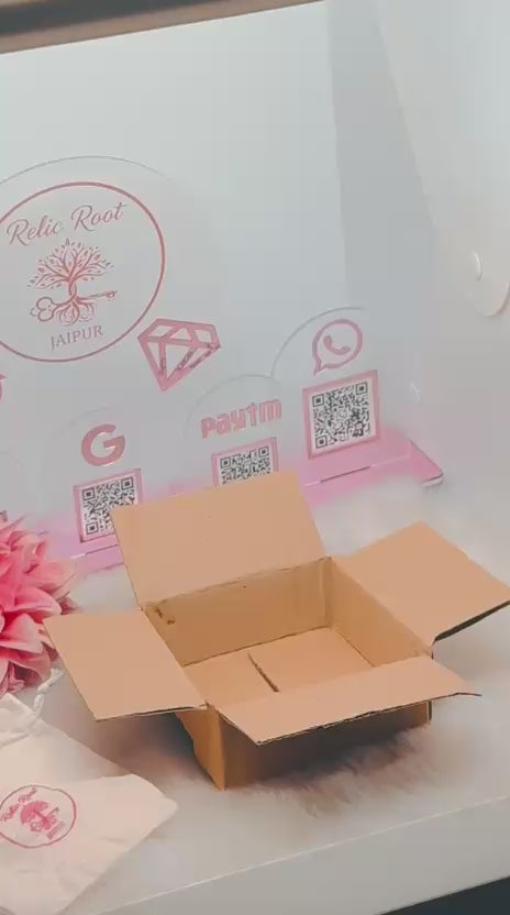 Load video: Video showing the careful packing process at Relicroot, including placing jewellery products securely, adding protective layers, sealing the parcel, and applying multiple stamps to ensure safe delivery.